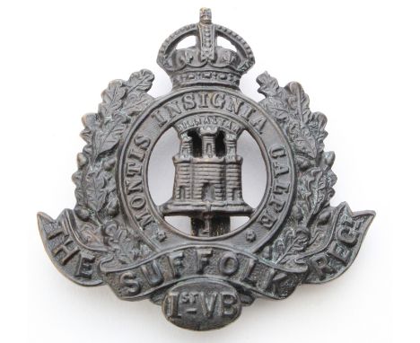 Suffolk's - O/R,  K.C. bronze 1st. V.B. Hat Badge.   Has a slider to the reverse.  