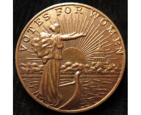 Suffragette American bronze badge.   Reads on front "Votes for Women".   Has a pin fitting and marked on the reverse "S.N. Me