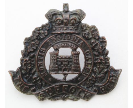 Suffolk's - Officers (possibly) bronze Hat Badge.  Has a Victorian crown.   2 tower variety.