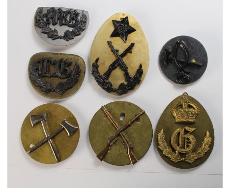 Badges (7) very interesting original Trade Arm badges includes a twin axe (possibly Pioneer's) badge.  All have brass backing