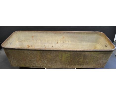 A substantial William Aickman Lynn cast iron trough, loose ring handles to sides, 183cm long, 66cm wide