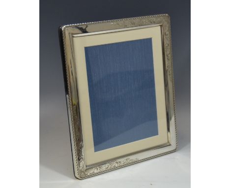 A large silver rectangular easel  photograph frame, 29cm x 24cm Birmingham  1992