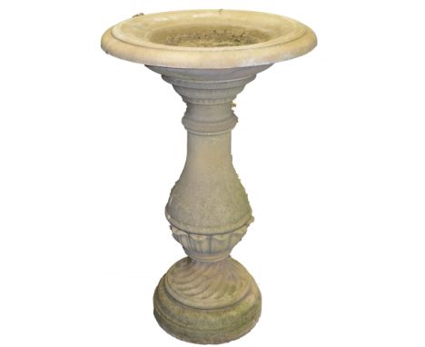 A 19th design composition lawn-centre bird bath, saucer-shaped plateau, acanthus-grasped baluster column, wrythern socle, cir