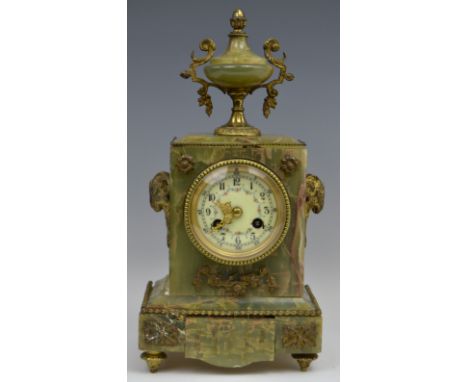 A 19th century French onyx and gilt ormolu mantel clock, the 7cm diam with black Roman numerals and floral swags, twin windin