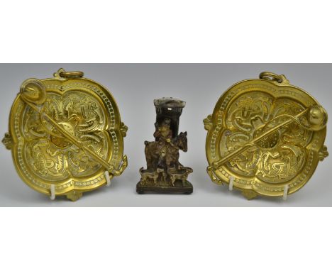 A pair of 19th century gilt brass dishes, each cast with strapwork and applied with riding crops and helmets, 13cm wide, c.18