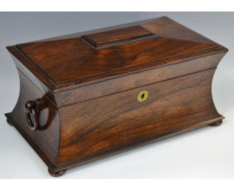 A William IV/Victorian rosewood sarcophagus shaped tea caddy ,  loose ring handles o sides, brass flower shaped escucheon, th