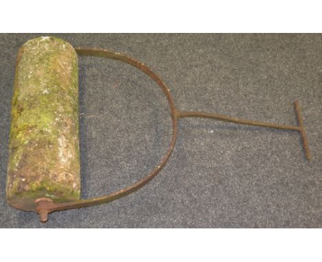 A stone and cast iron garden lawn roller, arched iron body and handle, 72cm x 41cm 