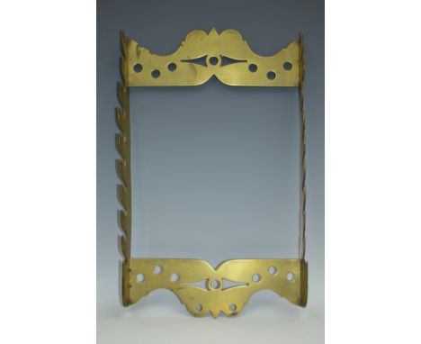 A George III brass wall hanging tavern church warden pipe rack, shaped and pierced borders, 40cm high, c.1800