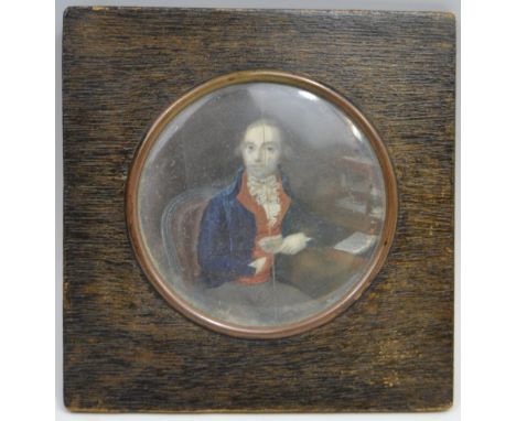 French School, 19th century, portrait of a gentleman, wearing a blue coat and red waistcoat,  watercolour on paper., circular