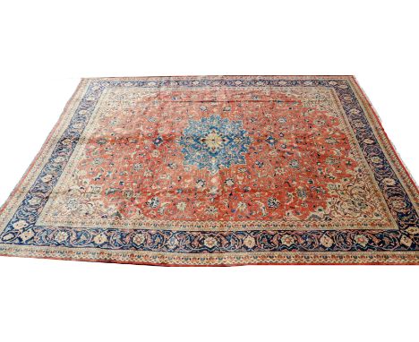 A Mahal carpet, the madder field in tones of cream , terracotta and blue, conforming border,412cm x 313cm 