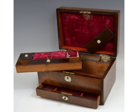 A Victorian rosewood lady's rectangular work box, the cover with mother-of-pearl cartouche, the interior with two scent flask