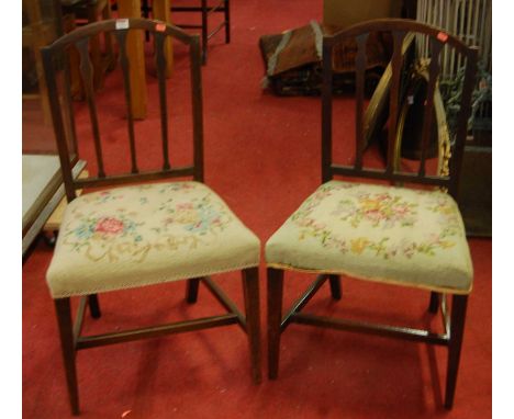 A pair of 19th century mahogany and floral tapestry stuff over seat dining chairs