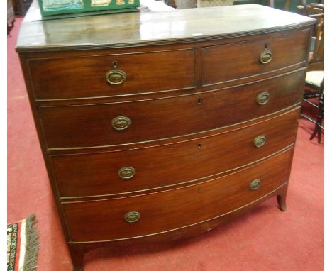 An early 19th century mahogany bowfront chest of two short over three long graduated drawers, on splayed bracket supports (on