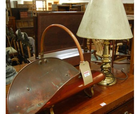 An early 20th century copper swing handled log bucket, together with a brass table lamp (2)