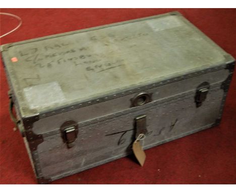 An early 20th century galvanised metal hinged travel trunk having end carry handles, width 79cm