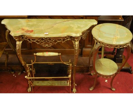 An onyx and pierced gilt metal serpentine console table, raised on cabriole supports, w.102cm; together with a similar onyx a