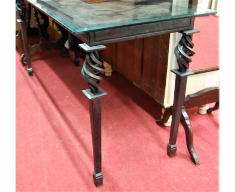 A heavy plate glass topped and painted wrought iron based long conservatory console table, width 153cm