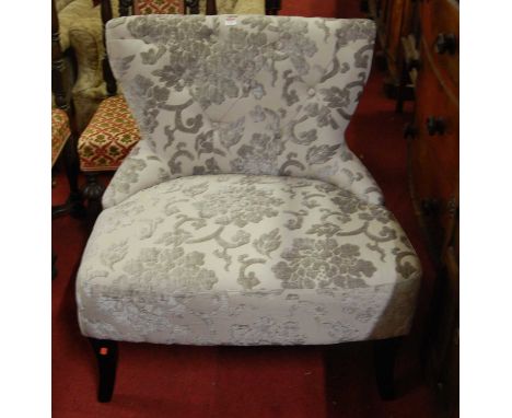 A pair of contemporary wide seated floral plush upholstered button back nursing chairs, width 80cmCondition report: Gross hei