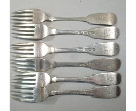 FIVE GEORGE III IRISH SILVER FIDDLE PATTERN DESSERT FORKS WITH UNICORN CREST, DUBIN 1800-1807 AND A SIMILAR LATER FORK BY JOH