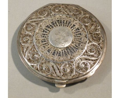 EGYPTIAN WHITE METAL FILIGREE AND NIELLOED CIRCULAR COMPACT, INITIALLED 'S', WITH INNER HINGED COVER, 7.8cm  DIAMETER (106g)
