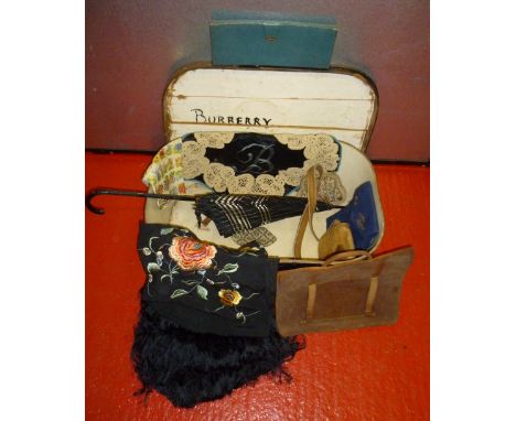 TRAVELLING TRUNK INSCRIBED "BURBERRY" CONTAINING A LEATHER JEWEL BOX, TWO BAGS, BURBERRY DAMASK TABLECLOTH, FLORAL EMBROIDERE