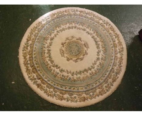 Chinese wool wash thick pile circular carpet, with floral and striped border with central lozenge, 49  diameter