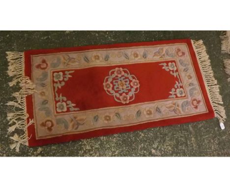Chinese thick pile red and cream ground wool wash carpet, with floral borders and Grecian Key style centre, 25  x 58  