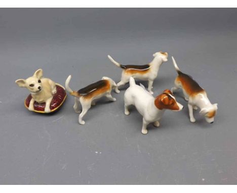 Three Beswick models of fox hounds, one other model of a terrier dog and a further Beswick model of a dog on a cushion (5)