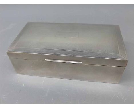 Hallmarked silver cigarette box, with engine-turned lid, 6 “  wide  