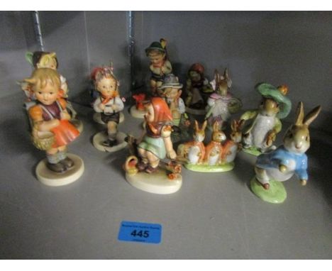 A group of Goebel Hummel figurines and four Beswick Beatrix Potter figures to include Benjamin Bunny holding a shoe in each h