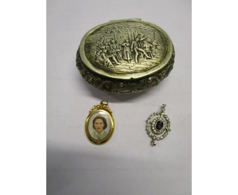 A mixed lot to include a miniature in a 9ct gold frame, a silver stone set pendant and a Continental silver plated embossed t