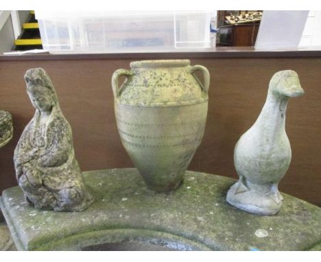 Weathered composition stone garden ornaments and pots to include a model duck, an Oriental figure, a vase and two planters 