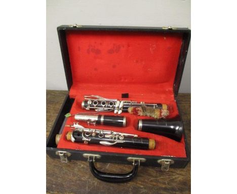 A Regent Boosey &amp; Hawkes clarinet in a case 