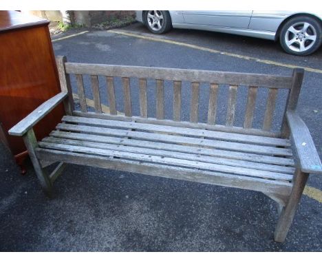 A teak garden bench 33"h x 62 1/2"w 