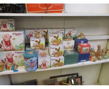 A collection of model 'Piggins' pigs, boxed, Pendelfin models of rabbits and Lilliput Lane cottages 