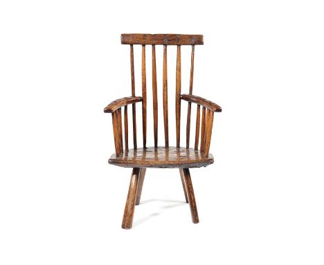 An ash stick-back Windsor armchair, Welsh, circa 1800Of small size, with flattened arms, arched shaped seat and facetted legs