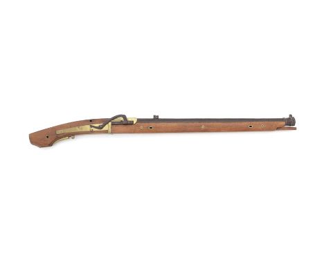 A heavy matchlock musketThe 69cm sighted round barrel, hexagonal toward the breech, tulip shaped muzzle, the entire surface o