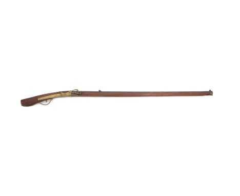 A matchlock musketThe 100cm sighted octagonal barrel inlaid overall with dragons and clouds in silver nunome, brass back-acti