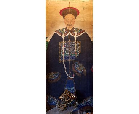 A Chinese ancestor portrait of a Mandarin official, Qing Dynasty, 2nd half 19th centuryWearing blue formal Court dress, milit