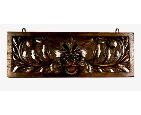 A group of 19th century carved architectural elementsIn oak and mahogany of various dates, comprising: an oak carved panel wi