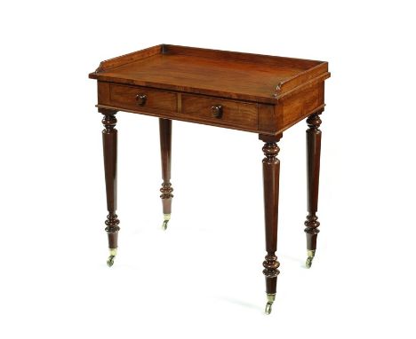 A George IV mahogany side or dressing table attributed to GillowsThe rectangular three quarter galleried top above a pair of 