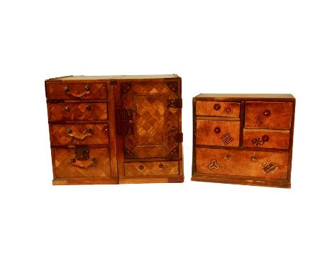 A group of Japanese and other boxes, mostly late 19th century and later

Comprising: a Meiji period Japanese parquetry work b