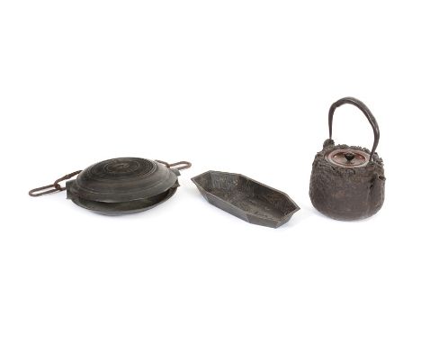 Three items of Japanese metalware, Edo and Meiji periodComprising: a Meiji period cast iron tea pot, the swing handles decora
