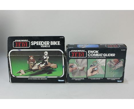 Two Star Wars, Return of the Jedi, Kenner action figure accessories, Ewok Combat Glider, and Speeder Bike Vehicle, both in or