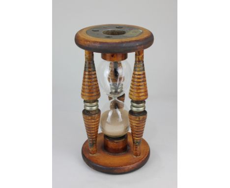 An early 20th century oak bobbin, by repute made by T J Gower Butt & Co Ltd, Blackburn, Lancashire, used in the cotton mills 