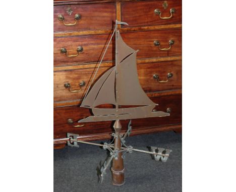 A copper weather vane in the form of a sailing ship, on conical base with arms to four compass points, 87cm