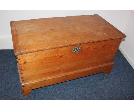 A pine blanket box with brass handles, on bracket feet, 114cm