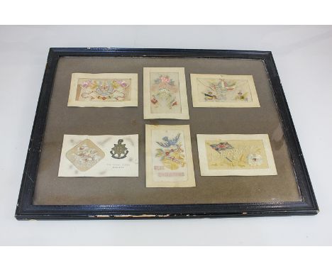 A collection of six First World War period embroidered greetings cards including The Royal Sussex Regiment, in glazed frame, 
