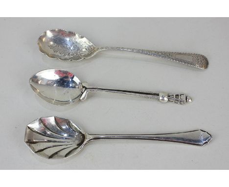 A George V silver caddy spoon, maker Mappin & Webb, Sheffield 1933, together with a Victorian silver spoon with chased design