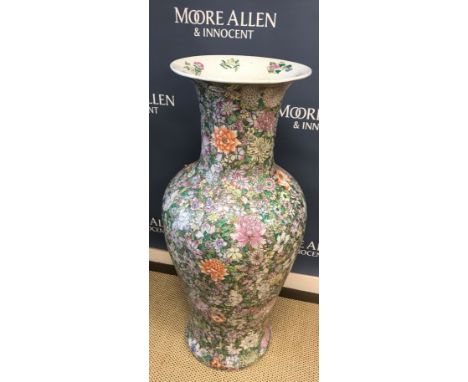A Chinese famille rose style floor vase of baluster form with all-over floral decoration, bearing six character Guangxu mark 